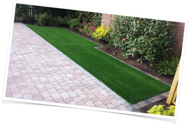 Artificial lawn and paving installation